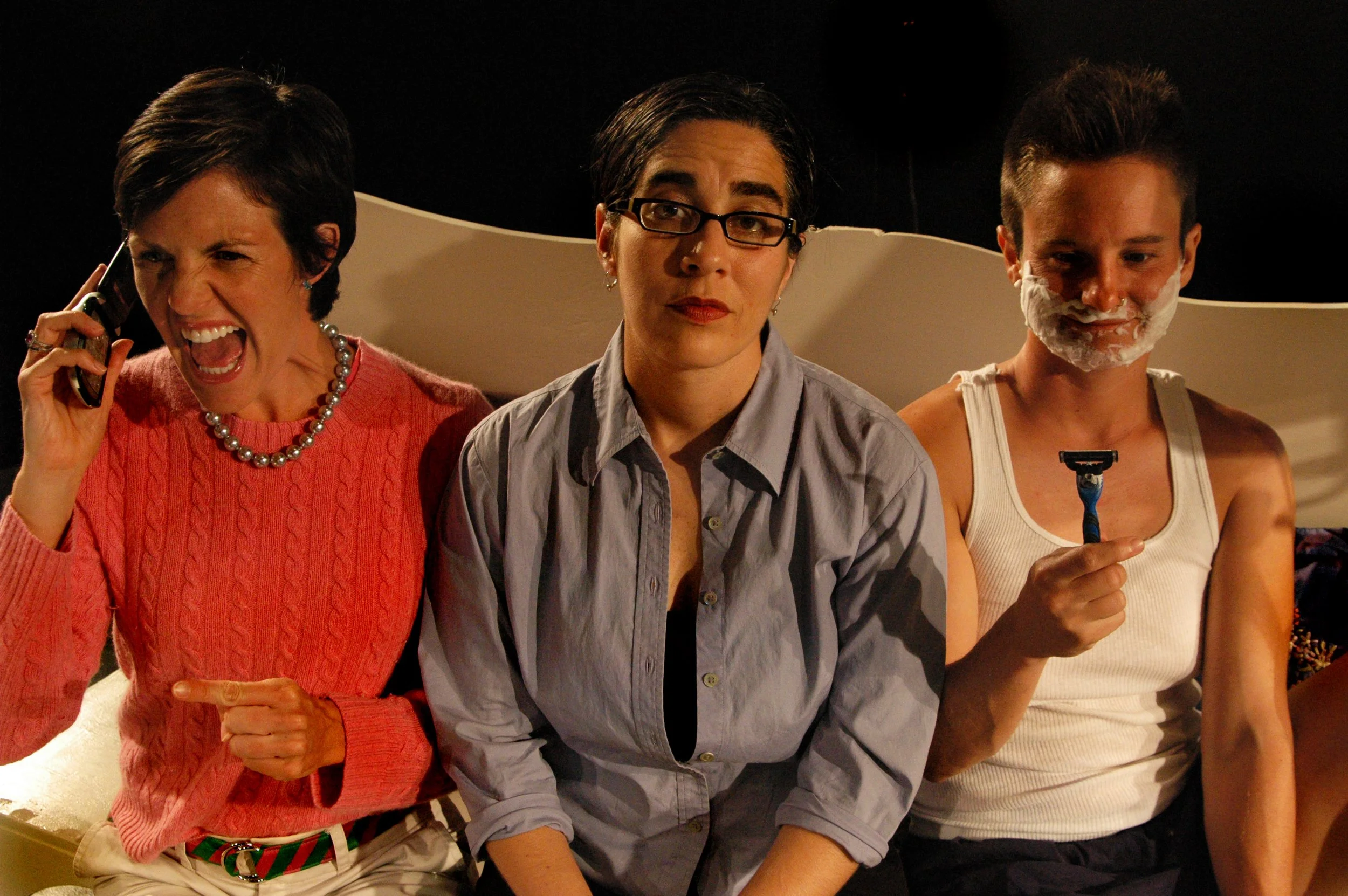 Three performers sharing a sharply comic scene from And Sophie Comes Too