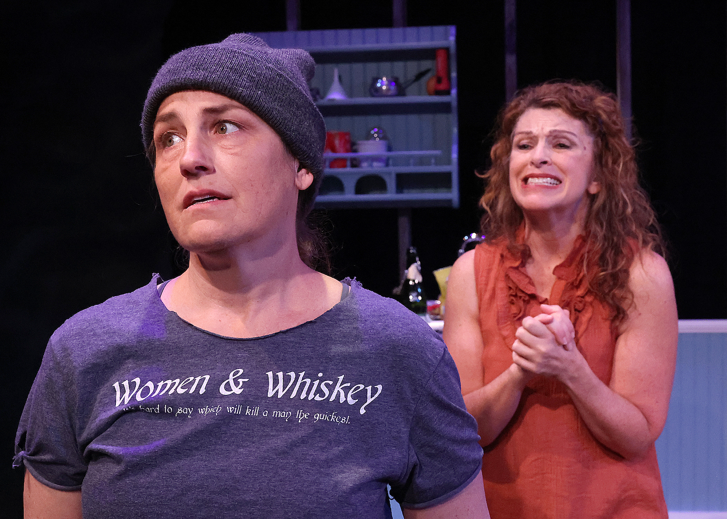 Two performers in an emotional scene from The Fade-Away Advantage